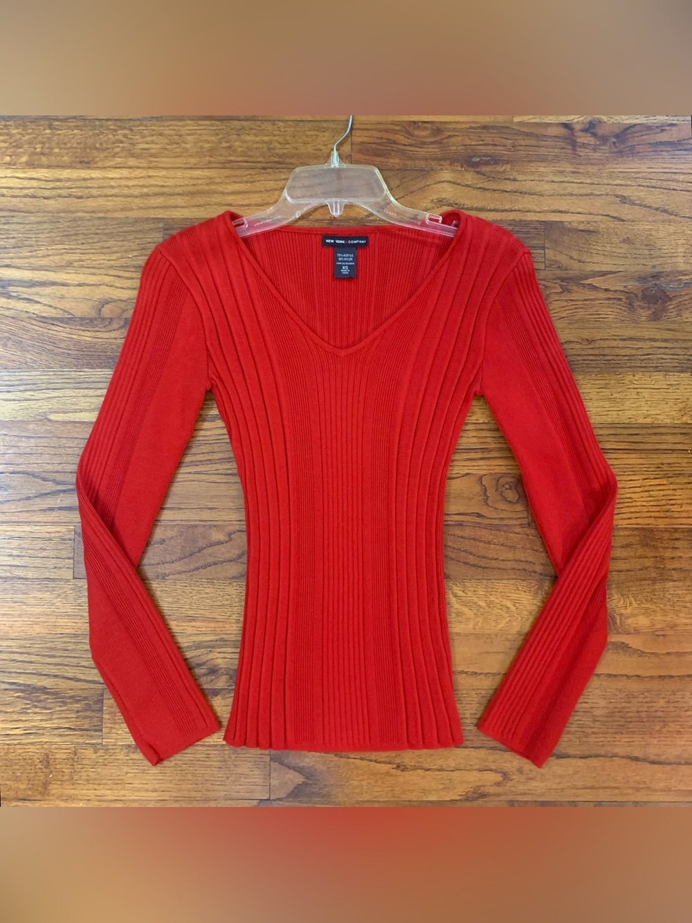 New York & Co. Red Ribbed LS Sweater Blouse
Size XS 0 - 2
V Neck
70% Acrylic 30%
